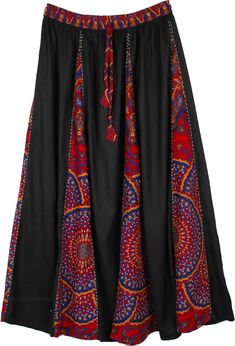 This is a long skirt with alternating bright print and black patchwork in sunray or accordion pleats that start out smaller at the waist and get larger toward the hem - a design that is known to make you look taller; the long linear patchworks are joined together and highlighted by hand embroidered thread work. It has an elastic waist with a drawstring to allow for flexibility and a comfortable fit.; Waist: 26"-36" Length: 36" ; Material: 100% Cotton (no lining); Care: Hand wash separately in co Black Patchwork Tiered Skirt, Black Tiered Patchwork Skirt, Black Bohemian Maxi Skirt For Festival, Bohemian Black Maxi Skirt For Festival, Black Long Lined Wrap Skirt, Black Long Wrap Skirt With Lining, Black Tiered Wrap Skirt With Lining, Black Tiered Lined Wrap Skirt, Black Patchwork Bottoms For Festival