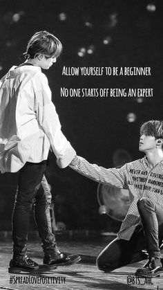 two young boys holding hands while standing next to each other with an inspirational quote above them