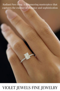 a woman's hand with a diamond ring on it and the words violet jewels fine jewelry