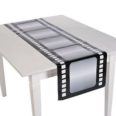 a table with a film strip design on it