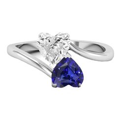 METAL SPECIFICATIONS White Gold 14K STONE SPECIFICATIONS Stone Name : Blue Sapphire and Diamond Stone Cut : Heart Stone Details : There is one heart cut sapphire approx. 1.50 carats (Approx. Size 6.5 x 6.5 mm) and one heart diamond approx. 1.50 carats (Approx. Size 6.7 x 6.7 mm) on the sides. Natural earth mined stones. Color : F Clarity : VS1 Quality of Sapphire : AAA Sapphire Treatment : Heated Total : Approx. 3 Carats RING SPECIFICATIONS Size : 6.5 (Can ship in any size, please send us a mess 3 Carat Ring, Blue Sapphire Diamond Ring, Heart Stone, Heart Diamond, Blue Sapphire Diamond, Sapphire Diamond Ring, Stone Heart, 3 Carat, Natural Earth