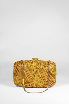 Dazzle with a crystal clutch featuring captivating leaf details that shimmer vividly. Available in both yellow and green, this elegant clutch includes a convenient shoulder strap for versatile use, adding a touch of glamour to any ensemble. Chic Yellow Clutch For Formal Occasions, Elegant Yellow Bags For Formal Occasions, Elegant Yellow Bag For Formal Occasions, Elegant Yellow Formal Bag, Elegant Yellow Formal Bags, Yellow Elegant Clutch For Formal Occasions, Elegant Yellow Clutch For Formal Occasions, Elegant Yellow Formal Clutch, Yellow Clutch Bag For Party