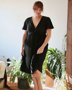 Chic A-line Belted Dress For Party, Black Fitted V-neck Belted Dress, Fitted Belted Dress With Short Sleeves For Party, Chic Pleated Waist Dress For Day Out, Spring Party Belted Dress With Short Sleeve, Spring Fitted Belted Dress With Pleated Waist, A-line Pleated Dress For Date Night, Fitted Pleated Midi Dress For Day Out, Spring Pleated Belted Dress For Party