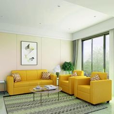 a living room filled with yellow furniture next to a large glass window covered in curtains