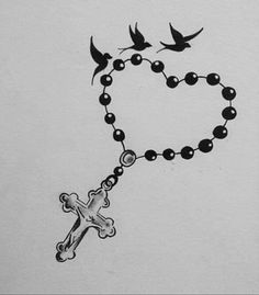 a drawing of a rosary with a cross and two birds flying above it on a white background