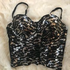 New Beautiful Marciano Silver/Black Sequin Bustier, Not Itchy Or Scratchy On Skin. Purchased At Marciano Store. Quality Sequin, Feels Like Metal Sequin Not Plastic. Smoke Free Home *I Have Other Marciano Listings Serious Buyers, No Holds Or Trades. Thank You For Browsing My Closet 10% Off When You Buy 2 Or More Items From My Closet Silver Fitted Tank Top For Party Season, Glamorous Silver Tank Top For Party, Glamorous Silver Party Tank Top, Silver Sequined Tank Top For Night Out, Sequin Silver Tank Top For Night Out, Sequined Silver Tank Top For Night Out, Fitted Shimmer Tank Top For Party, Glamorous Fitted Tank Top With Built-in Bra, Glamorous Fitted Shimmer Tank Top