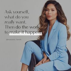 a woman sitting on top of a chair in front of a wall with a quote