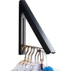 a rack with several pairs of glasses hanging from it's hooks and hangers