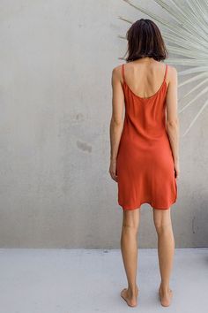 The IDIS silky slip dress is made from 100% silk crepe, has a wide scoop neck line and side splits - cut on the bias to fall just right. Can be worn as a dress or tucked into pants as a silk cami. Clothing that moves and evolves with you. Bringing you comfort and movability while maintaining a simple elegance. SIZE GUIDE XS: bust 76-82 cm | waist 64-70 cm | hips 78-84 cmS: bust 82-84 cm | waist 70-76 cm | hips 84-90 cmM: bust 84-88 cm | waist 76-82 cm | hips 90-96 cmL: bust 94-100 cm | waist 82- Coral Silk Slip Dress, Cheap Slip Dress For Beach, Cheap Summer Slip Dress, Luxury Red Silk Slip Dress, Red Slip Dress Casual, Affordable Sundress Slip Dress For Vacation, Cheap Summer Sundress Slip Dress, Cheap Mini Length Slip Dress For Beach, Cheap Fitted Slip Dress For Beach