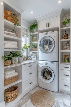 a washer and dryer in a white laundry room with open shelvings