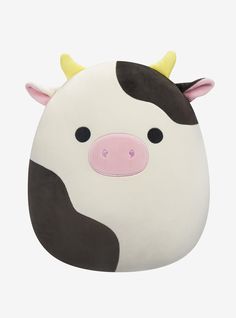 a stuffed cow with horns on it's head is shown in front of a white background