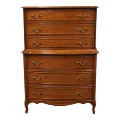 a wooden dresser with many drawers on it's sides and gold handles, against a white background