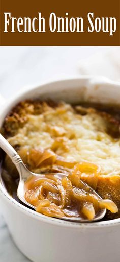 french onion soup in a white bowl with a spoon on the side and text overlay