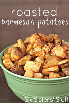 roasted parmesan potatoes in a green bowl on a wooden table with text overlay