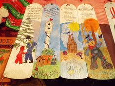 four bookmarks with pictures of children's books on them, all decorated in different styles and colors