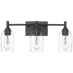 three light bathroom fixture with clear glass shades and black metal finish, on an off - white background