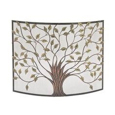 a decorative fireplace screen with a tree on it