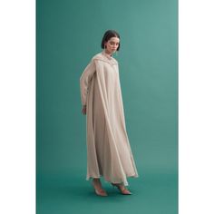 Retro Chic Fashion: Sandy 70's Inspired Abaya - By Baano Spring Beige Long Sleeve Abaya, Beige Long Sleeve Kaftan For Eid, Floor-length Beige Abaya For Eid, Elegant Brown Long Sleeve Thobe, Elegant Beige Long Thobe, Elegant Long Beige Thobe, Retro Chic Fashion, Evening Jumpsuit, Bygone Era