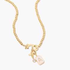 This Molly Enamel Charm Necklace is the perfect necklace to create your charm story! It comes with a blush initial enamel charm and a sparkly cz crystal charm, and the hinge closure. Available in 14k gold plated brass Avery Necklace: Size: 18" bead necklace, hinge closure measures 1/2", 4mm beads Molly Initial Enamel Charm: 3/8"x1/4" enamel filled charm, hinge closure Leia Charm: 3mm round cz bezel, hinge closure Protected with an anti-tarnish barrier With customization this item is FINAL SALE S Nails Jewelry, Upscale Fashion, Modern Jewellery Design, 23rd Birthday, Luxe Jewelry, Jewelry Tattoo, Dope Jewelry, Nail Jewelry, Gold Charm Necklace