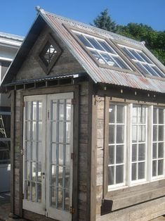 Here is a bunch of solid reasons why your yard could use the addition of a greenhouse, with 15 inexpensive pallet greenhouse plans & designs to choose from. Pallet Greenhouse, Old Door Projects, Pallet House