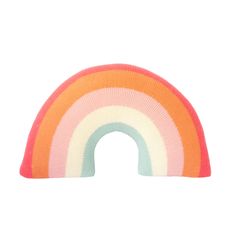 a knitted rainbow toy on a white background