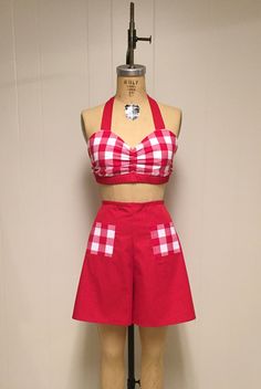 "The Notebook-Alley Costume. This adorable halter top is a reproduction of a 1945 sun and swim top. This easy to wear top has tie straps which allow you to easily adjust the top to your figure. The top is fully lined. All seams are neatly finished. The top has a center front gathered pinch. The cute turban is made from a vintage pattern and is so easy to wear. Our famous Lola tap shorts couldn't be better except we added two fun pockets on the hips. How cute is this outfit for a picnic or a cost 1950's Aesthetic, Outfit For A Picnic, Tap Shorts, Paradise Kiss, Disney Bounds, Feedsack Fabric, The Notebook, Swim Skirt, Novelty Print