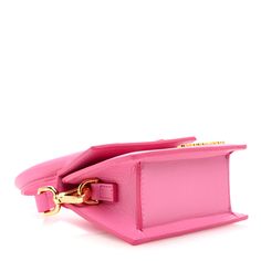 This is an authentic JACQUEMUS Smooth Calfskin Le Chiquito Moyen in Pink. This chic bag is crafted of smooth calfskin leather in pink. The bag features a top handle, an optional leather shoulder strap, and gold hardware. The front flap opens to a beige fabric interior with a patch pocket. Le Chiquito Moyen, Pink Pouch, Chic Bags, Beige Fabric, Gold Hardware, Patch Pocket, Top Handle, Calf Skin, Hot Pink