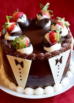 a chocolate cake with strawberries on top