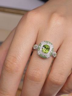 *Condition: Brand new *Center Stone: Natura Tsavorite Green Garnet, Cushion Shape, approx 1.15ct *Side Stone: Natural white diamond, round cut (VS1 clarity and F color) Natural Tsavorite round cut *Ring Weight: 5.62g (depend on the ring size) *Metal Purity: Optional Each piece is made-to-order with care and special attention to detail. all items are made with conflict-free diamonds and gems. Size: made to order The item will be gift wrapped and shipped. ------------------------------------------ Tsavorite Jewelry, Gold Garnet Ring, Double Halo Ring, Round Cut Ring, Handmade Gold Ring, Buying An Engagement Ring, Green Garnet, Double Halo, 18k Gold Ring