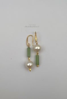 Pearl and Green Aventurine asymmetric Earrings | Aventurine Earrings | Gemstone  Earrings | Pearl earrings | Asymmetric Earrings | Green stone earrings Freshwater Pearls are combined with Aventurine stones The pearls themselves have a beautiful sheen called lustre, they are perfect shape, please note, they are natural freshwater pearl, has a ridges, some tiny Pits or pitting blemishes that is unique to Freshwater pearls and measure between approximately 10mm Earrings length approx. 5 cm  14k gold filled earring findings Aventurine is a stone of prosperity.  It reinforces leadership qualities and decisiveness.  Promotes compassion and empathy.  Encourages perseverance. These beautiful and stylish earrings comes gift wrapped ready to give or to keep Gemstone Earring Ideas, 2024 Accessories Trends, Sage Green Earrings, Green Aventurine Jewelry, Earring Packaging, Aventurine Earrings, Asymmetric Earrings, Green Stone Earrings, Pearl Earrings Designs