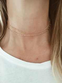 "This is a beautiful, simple and delicate choker featuring a gold beaded curb chain. It is all made out of 14/20 gold-fill. You get to customize the length of your choker to ensure that it lays where you would like on your neck. Pictured here is 13.5\". If you need a different length, please leave me a note at checkout requesting the length you need. This necklace can be worn alone or is perfect for layering, as it is shown here with our... Gold Circle Choker: https://www.etsy.com/listing/459358 Minimalist Gold Choker With Satellite Chain, Dainty 14k Gold Filled Chain Choker Necklace, Trendy Gold Beaded Chain Choker, Dainty Gold Choker With Satellite Chain, Dainty Gold Chain Choker, Dainty 14k Gold Filled Choker, Minimalist 14k Gold Filled Choker Chain Necklace, Minimalist 14k Gold Filled Chain Choker, Minimalist Gold Chain Choker