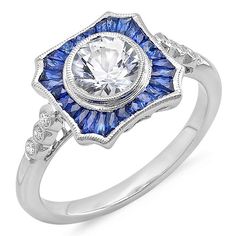 a white gold ring with blue sapphire and diamonds