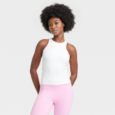 Why we're ALL IN: Everyday soft racerback tank top made with stretchy fabric with moisture-wicking, quick-dry technology. Features partial lining and a built-in shelf bra with removable cups for customizable coverage. Plus, the UPF 50+ rating adds extra protection during outdoor workouts. All in Motion™: Made for every move, priced for every day. Active Tank Tops, Bra Cup, High Neck Tank, All In Motion, Sleeveless Pullover, Pink Tee, Ribbed Tank Tops, Hem Style, Outdoor Workouts