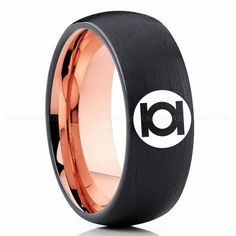 black and rose gold plated ring with an id logo on the inside of it