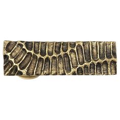 an antique brass alligator skin belt buckle