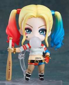 an action figure holding a baseball bat and wearing blue eyes, blonde hair and white shirt