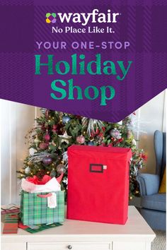 a christmas tree with presents in front of it and the words, your one - stop holiday shop