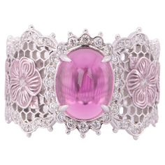 ♥ 2.52ct Rubellite Tourmaline Ring 18K White Gold Wide Band Intricate Lace and Pink Floral Design ♥ The item measures 14mm in length, 10.5mm in width, and 6mm in height. ♥ Ring size: US Size 7.75 (Free resizing up or down 1 size) ♥ Material: 18K Gold ♥ Gemstone: Tourmaline, 2.52ct. Diamond, 0.56ct ♥ All stone(s) used are genuine, earth-mined, and guaranteed conflict free! As is with anything that is naturally occurring, our gemstones or pearls will have imperfections, e.g. inclusions in the gemstones, unevenness in the pearl nacre. ♥ Free shipping in the US. ♥ This item is in stock and ready to ship right away! Pink Floral Design, Rubellite Tourmaline, Right Hand Rings, Tourmaline Ring, Wide Bands, Jewelry Rings Engagement, Pink Floral, Tourmaline, Jewelry Collection