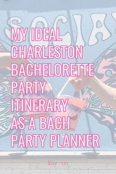 someone is painting the side of a building with pink lettering on it that says, my ideal charleston bachelor party