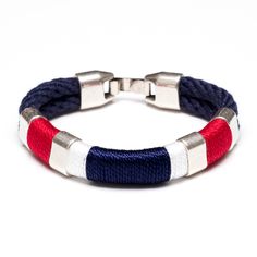 -Hand dyed navy blue cotton rope-Silver plated clasp closure-Silver plated spacer beads-Hand wrapped red, white, and navy thread detail************************************** Sizing: If you're looking for a comfortable fit, we recommend ordering 1/2" larger than your wrist size (i.e. if your wrist measures 6.5", choose size 7"). If you're not sure, the size chart below can be used as a guide: 6.5” – Women’s Extra Small 7” – Women’s Small 7.5” – Women’s Medium 8” – Women’s Large / Men’s Small 8.5” Nautical Bracelet, Nautical Rope, On The Ocean, Nautical Jewelry, Nautical Style, Cosmetic Items, Nautical Fashion, Navy Gold, Hand Wrap