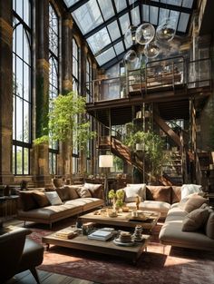 a living room filled with furniture and lots of windows