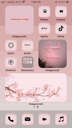 an iphone screen with pink and grey colors