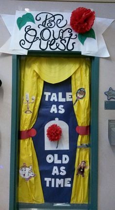 a door decorated to look like an old time show stage with flowers and decorations on it