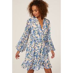 Blue floral chiffon (100% Polyester). Wrap. V-neck. Long sleeves. Tie closure. 37" from shoulder to hemline. Imported. Spring Floral Print V-neck Chiffon Dress, Blue Casual V-neck Chiffon Dress, Chic V-neck Chiffon Dress For Spring, Elegant Blue Floral Print V-neck Dress, Floral V-neck Chiffon Dress With Ruffles, Spring Garden Party V-neck Chiffon Dress, Spring Floral Print Mini Chiffon Dress, Floral Print Chiffon V-neck Mini Dress, Chiffon V-neck Mini Dress With Floral Print