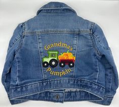 Adorable one of a kind upcycled Baby Gap denim jacket size 6-12 months. Perfect for your little one's first trip to the pumpkin patch. Design is made with appliqué and embroidery technique, and up cycled jacket is in like new condition. Custom orders available incorporating your design ideas and embroidered names and monograms. Custom Embroidered Cotton Outerwear For Fall, Cotton Outerwear With Custom Embroidery For Fall, Fitted Denim Jacket With Custom Embroidery For Fall, Fall Denim Jacket With Custom Embroidery, Custom Embroidered Long Sleeve Denim Jacket For Fall, Long Sleeve Denim Jacket With Custom Embroidery For Fall, Pumpkin Patch Design, Embroidered Names, Gap Denim Jacket