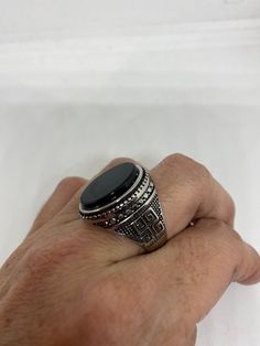 Cool Vintage Rock and Roll star men's ring Nice heavy ring, gold finished Stainless Steel Unused stock from the 1980's I have an assortment of sizes from 8-13 Please add your size to the order in a message and I will send the size you require. If I am out of stock in your size, I will list the ones I have available for replacement. If I am sold out in the sizes you would prefer, I will cancel and refund you, Thank you All jewelry is shipped in a nice gift box. Check out our over a THOUSAND great Black Stainless Steel Ring With Polished Finish, Black Stainless Steel Rings For Gift, Modern Black Engraved Rings, Silver Onyx Signet Ring, Mens Stainless Steel Rings, Vintage Gothic, Vintage Rock, Vintage Heart, Men's Ring