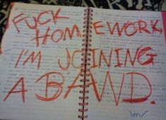 an open notebook with writing on it that says rock home work i'm joining a bawd