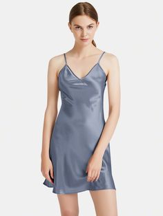 A silk short slip dress with an incredibly luxurious feel. Delicate V neckline and adjustable straps offer a seductive glimpse of bare skin. Elegant Mini Dress With Built-in Bra For Night, Elegant Satin Mini Dress With Adjustable Straps, Elegant Spring Camisole, Elegant Spring Mini Camisole, Elegant Satin Dress With Spaghetti Straps For Night, Elegant Mini Length Camisole With Adjustable Straps, Elegant Blue Mini Dress With Adjustable Straps, Summer Night Satin Dress With Spaghetti Straps, Elegant Mini Length Camisole For Night Out