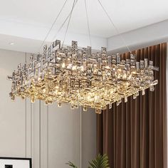 a large chandelier hanging over a dining room table