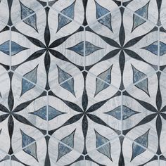 an artistic tile design with blue and white colors